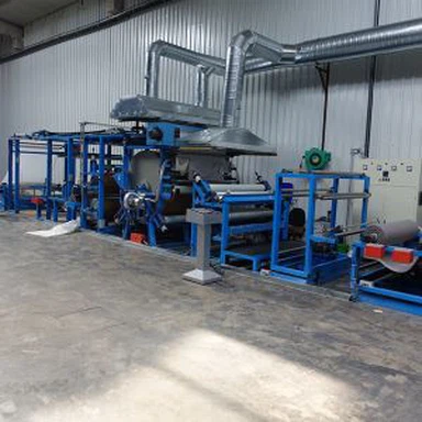 布フィルム貼付装置